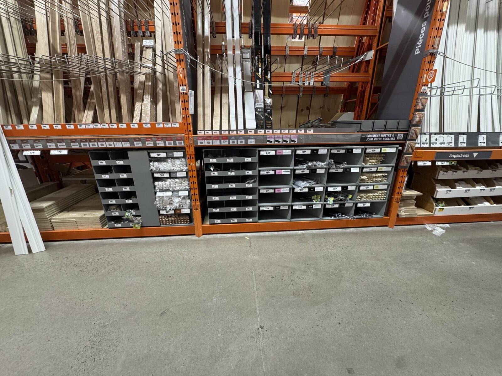The display seen along the aisle, fitted into the lower bays of the orange pallet racking