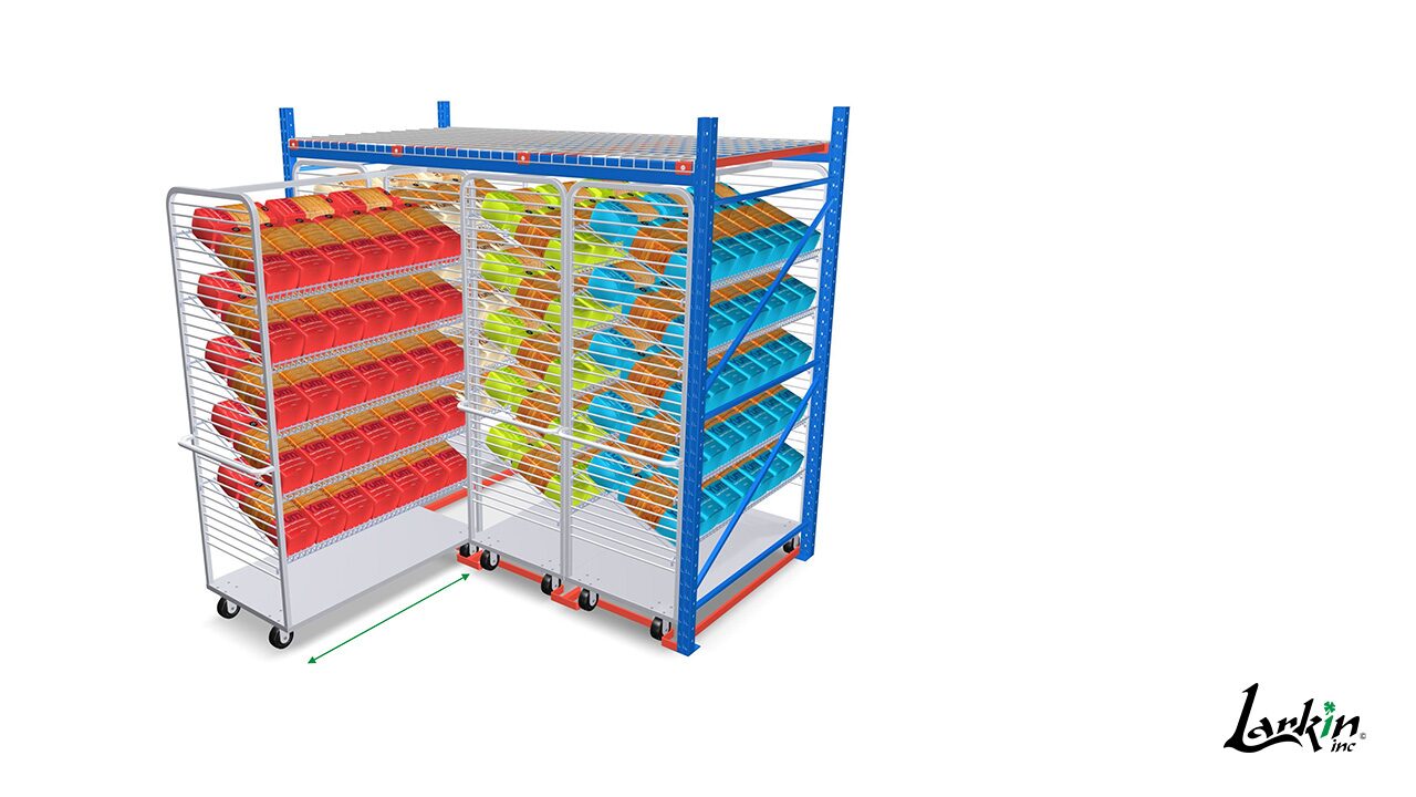 A Versa Cart of small parts bins rolled out from a rack bay stocked with more of the same