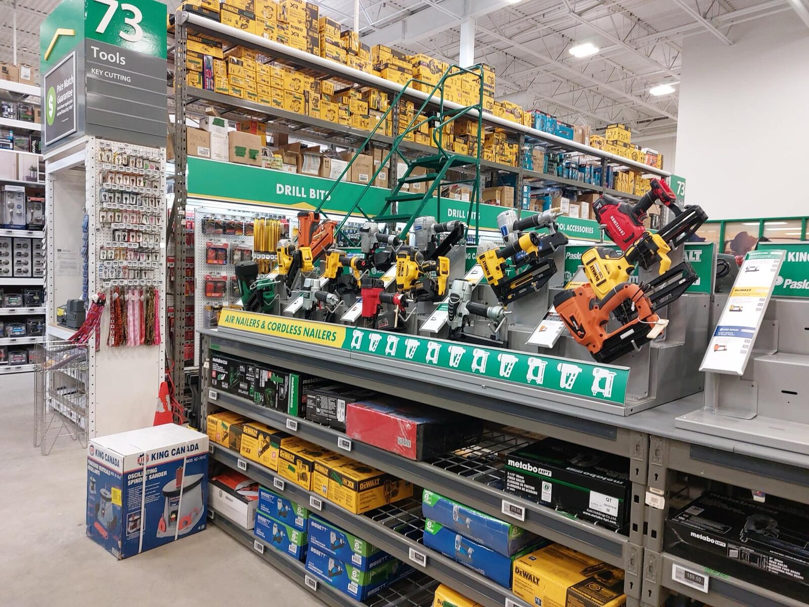 Air nailers and cordless nailers presented on the display deck in the Kent tools aisle